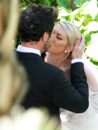 EXCLUSIVE: Stassi Schroeder surprises her husband Beau Clark with her new wedding dress ahead of the second upcoming ceremony in Rome. 12 May 2022 Pictured: Stassi Schroeder; Beau Clark Photo Credit: ROMA/MEGA TheMegaAgency.com +1 888 505 6342 (Mega Agency TagID: MEGA856695_022.jpg) [Photo via Mega Agency]